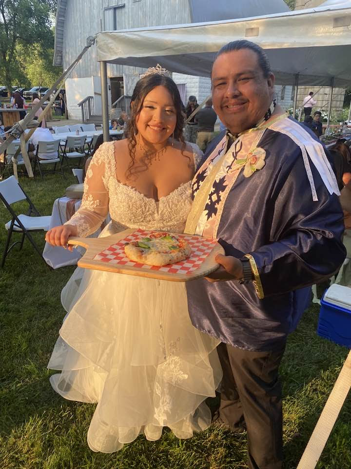 Wedding couple enjoying Kyes Guys Pizza